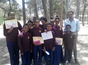 students-at-bci-academy-in-ethiopia-hold-award-certificates-earned-at-an-academic-competition