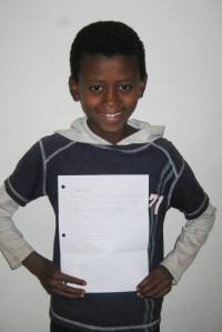 sponsored child with letter